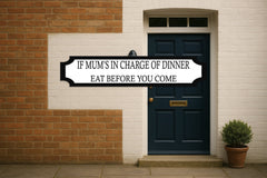 IF MUM'S IN CHARGE OF DINNER · EAT BEFORE YOU COME — personalised 3D street sign, shown in place