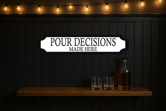 POUR DECISIONS · MADE HERE — personalised 3D street sign, shown in place
