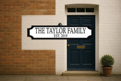 THE TAYLOR FAMILY · EST. 2019 — personalised 3D street sign, shown in place