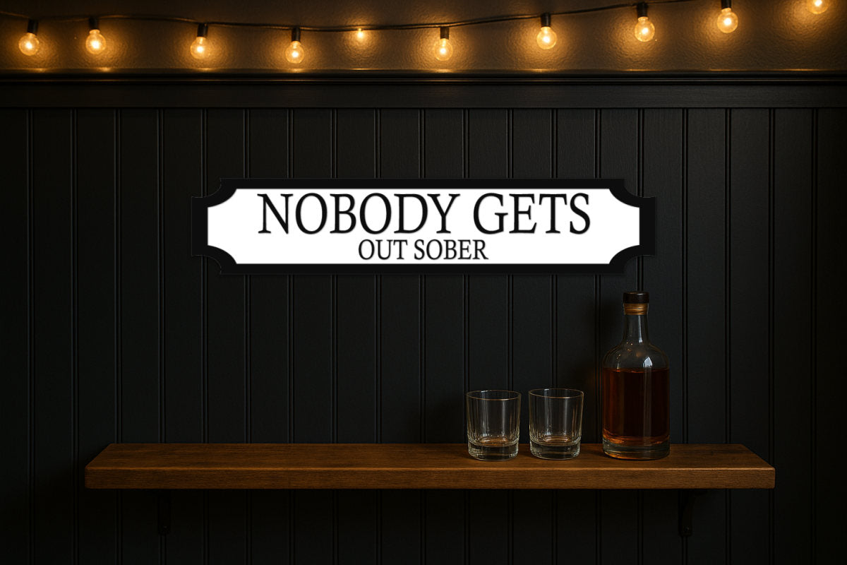 NOBODY GETS · OUT SOBER — personalised 3D street sign, shown in place