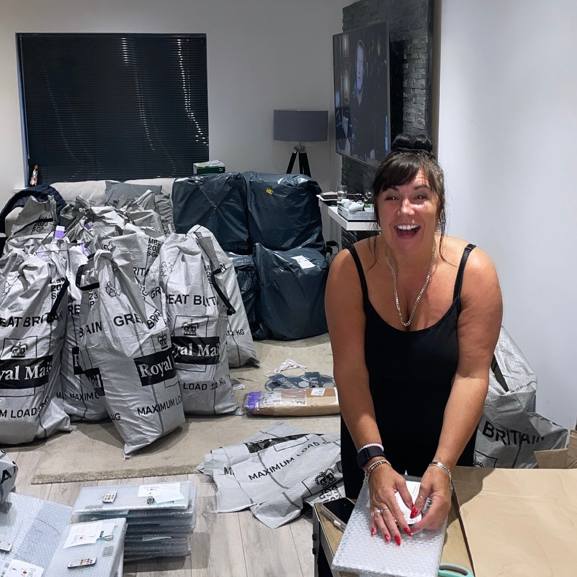 Royal Mail sacks of orders filling the house